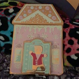 Two eye shadow pallets and a bronzer pallet